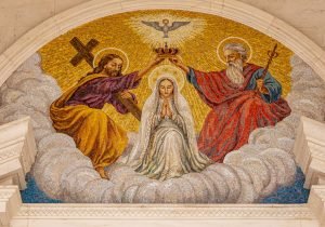 Detailed mosaic of the Holy Trinity at Fátima Sanctuary, Santarém, Portugal.